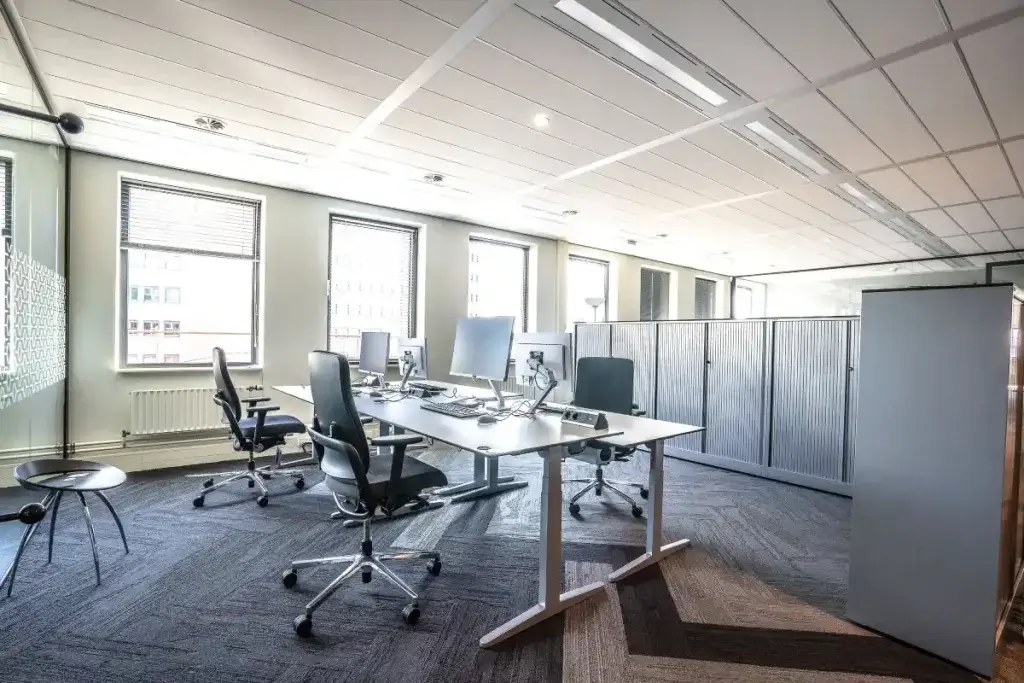 Ergonomic office workstation set up as a California reasonable accommodation for an employee