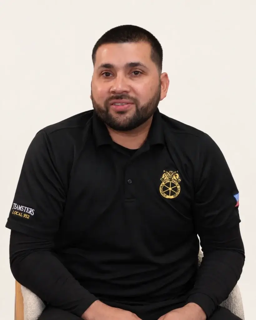 Abramson Labor Group client, a man in a black polo shirt