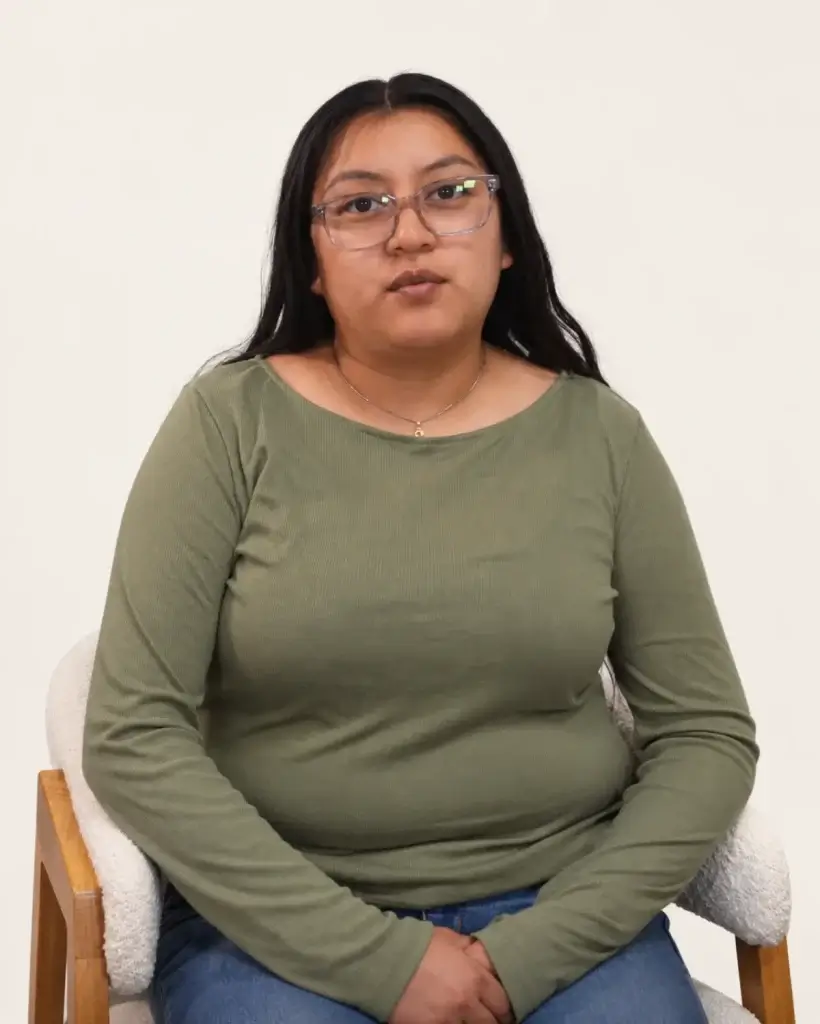 Abramson Labor Group client, a woman in a green sweater