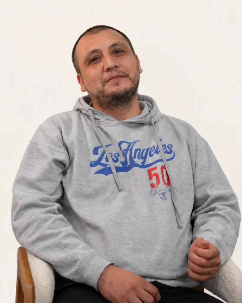 Abramson Labor Group client, a man in a gray Los Angeles hoodie